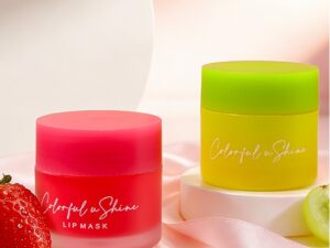 Colorful ushine fruit scented lip mask pots in red strawberry and yellow grape designs